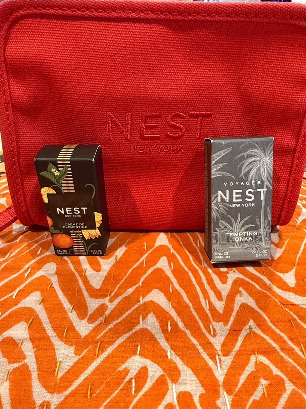 Nest travel case with two perfume samples. All new and unopened